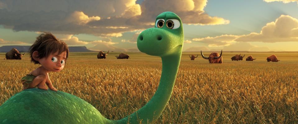 Spot and Arlo have a job to do rounding up longhorns in "The Good Dinosaur."