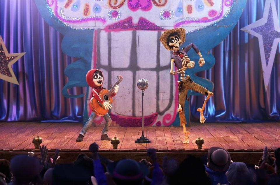 Aspiring musician Miguel (voiced by Anthony Gonzalez) teams up with charming trickster Hector (Gael García Bernal) for a talent show in the Land of the Dead in Pixar's animated "Coco."