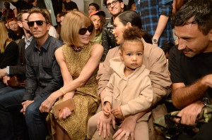 NEW YORK, NY - SEPTEMBER 16: Seth Meyers, Anna Wintour, Kim Kardashian West and North West attend Kanye West Yeezy Season 2 during New York Fashion Week at Skylight Modern on September 16, 2015 in New York City. (Photo by Kevin Mazur/Getty Images for Kanye West Yeezy)