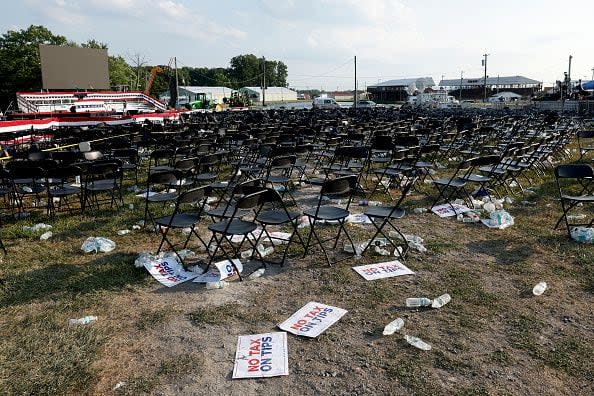 BUTLER, PENNSYLVANIA - JULY 13: Campaign signs and empty water bottles are seen on the ground of a campaign rally for Republican presidential candidate former President Donald Trump on July 13, 2024 in Butler, Pennsylvania. According to Butler County District Attorney Richard Goldinger, the suspected gunman is dead after injuring former President Trump, killing one audience member and injuring at least one other. (Photo by Anna Moneymaker/Getty Images)