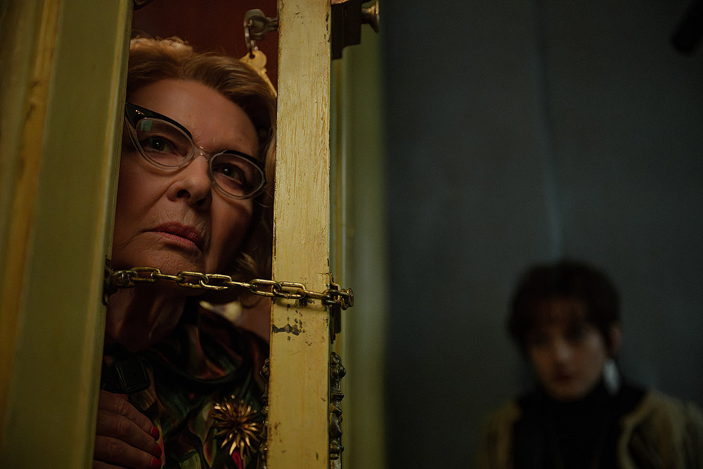 Dianne Wiest as Minnie Castavet and Julia Garner as Terry Gionoffrio in Apartment 7A