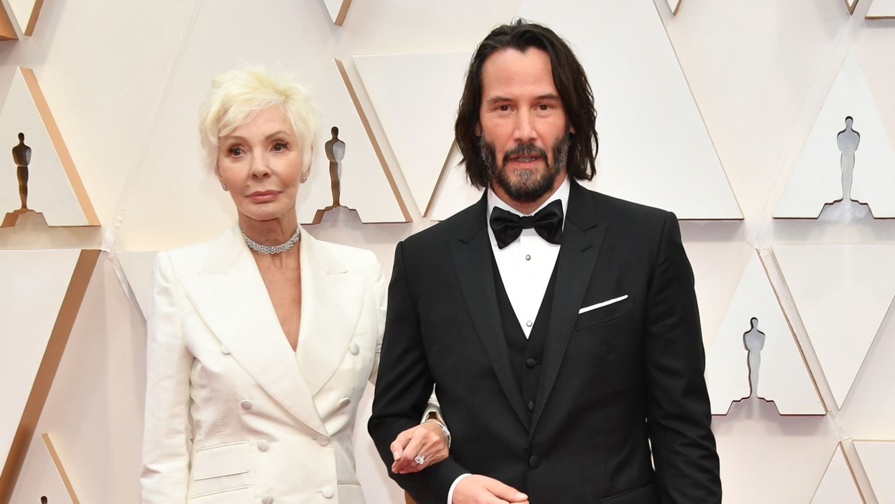 Patricia Taylor and Keanu Reeves at the 2020 Oscars ceremony.