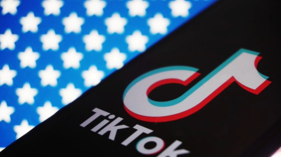 The TikTok logo is seen on a screen.